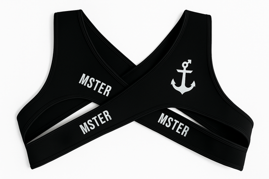Black fetish harness with 'MSTER' branding and anchor design on a white background