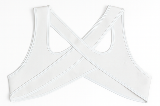 White fetish Harness with criss-cross design on a white background